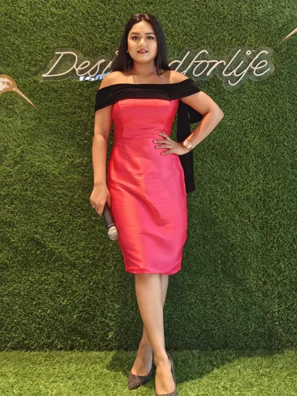 A chic look for hosting an auction ceremony. The right outfit helps set the tone for a fun yet competitive event.