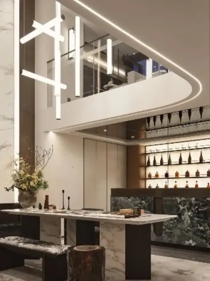 I design spaces that feel both grand and inviting. This interior render shows a double-height dining area with a marble table, complemented by a custom bar and a striking modern chandelier, demonstrating my approach to integrated interior architecture.