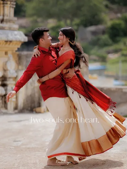 A dynamic shot of a couple dancing, with the text "two souls, one heart" overlaid, emphasizing their connection.