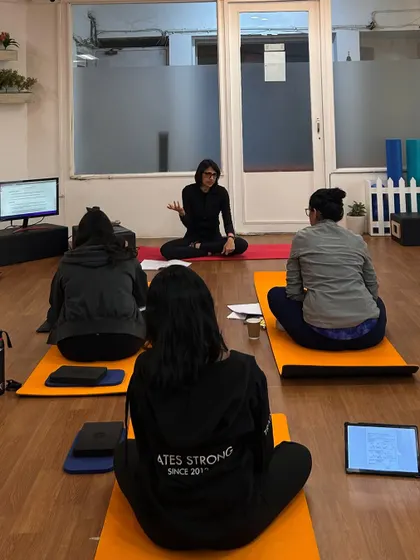 The theory behind the movement is just as important as the practice. I lead a classroom session during the Mat Pilates course, breaking down complex concepts into easy-to-understand principles.