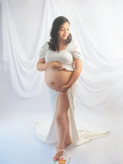 Another angle from our white-on-white session, this image captures a quiet, reflective moment. These are the memories you will look back on with so much love.