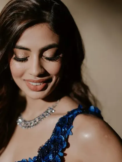 A close-up of the Sangeet makeup. I created a soft smokey eye and a nude lip to balance the sparkle of her outfit.