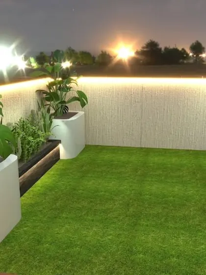 A proposed design for a small, functional green corner. This render shows how we can use planters and lighting to beautify even utility areas on a terrace.