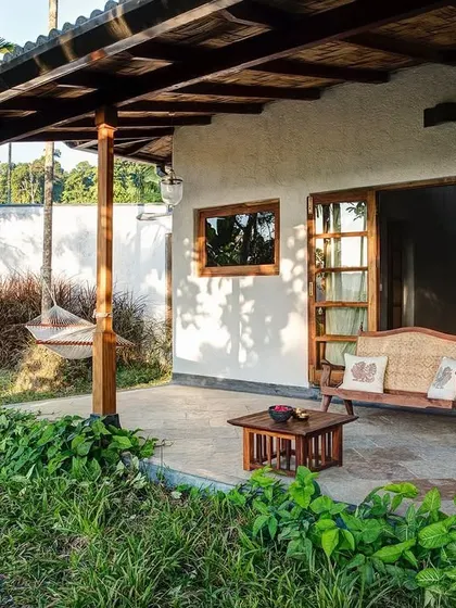 The private veranda of a Garden Suite room, a perfect spot for morning coffee surrounded by nature.