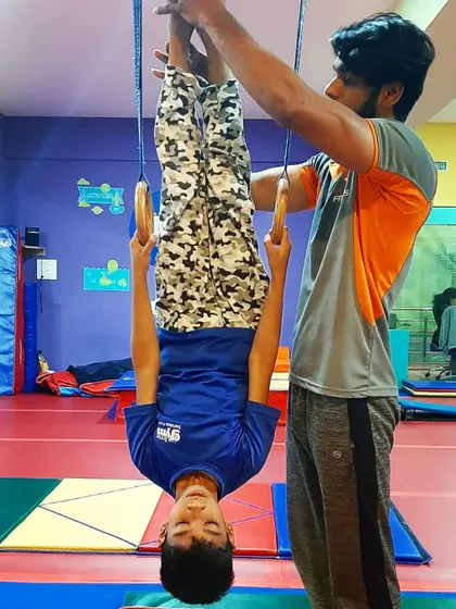 The pencil hang on the rings is a great stretching exercise for the back, arms, and shoulders, and it builds incredible core strength.