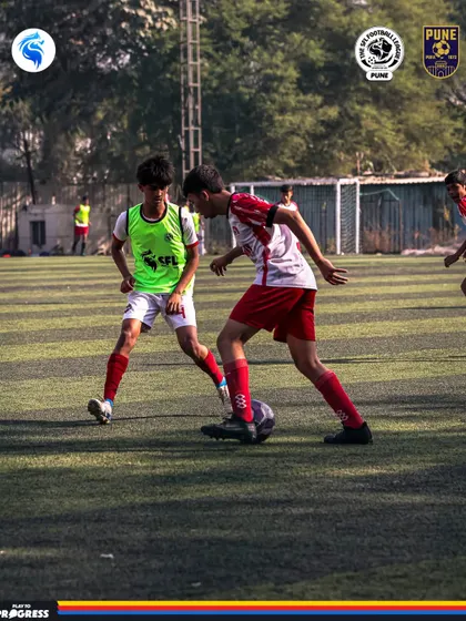 A skillful turn from a player to get away from his marker during a competitive match in Pune.