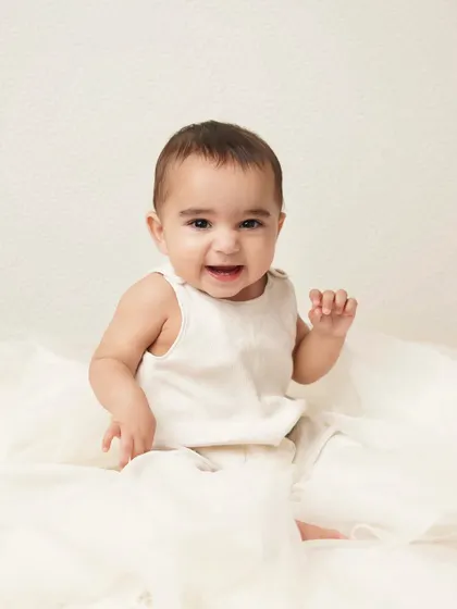 A big, happy grin from this little guy. His joy is contagious, and this photo is sure to make anyone smile.