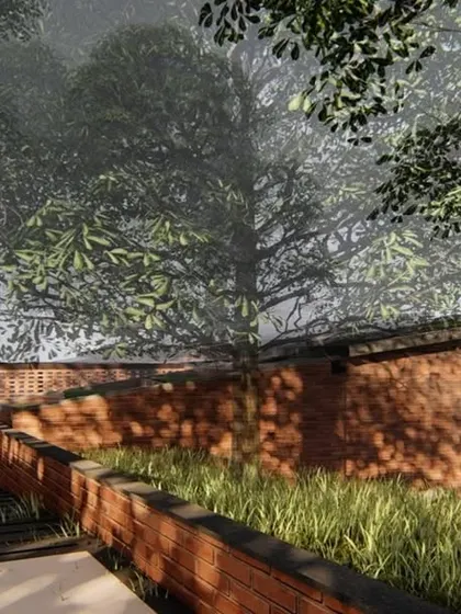 The entrance approach to the Atlanta Wellness Home is designed as a subtle incision in the landscape, with brick retaining walls guiding the path towards the building, which remains partially hidden.