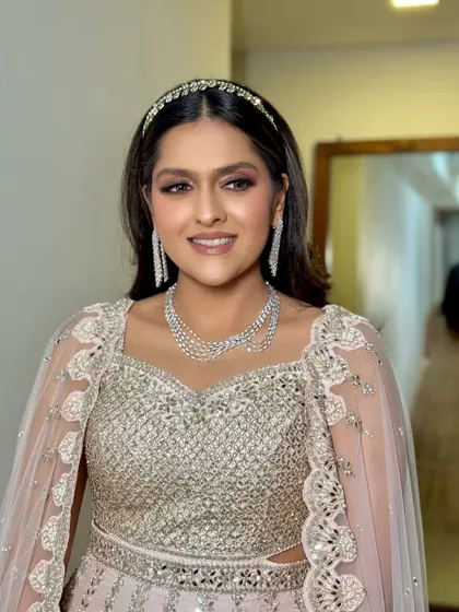 Another angle of this stunning party look, showing how the makeup enhances her features from all sides.