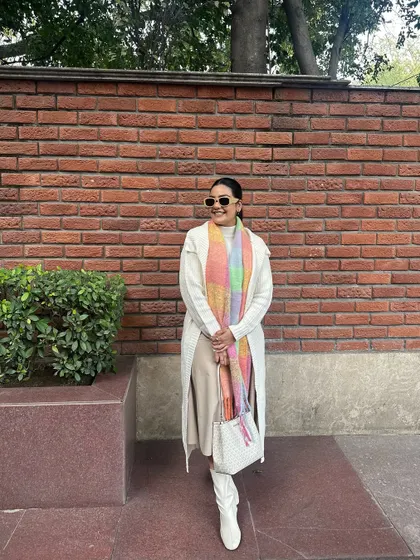 A full-length view of this cozy and colorful winter look.