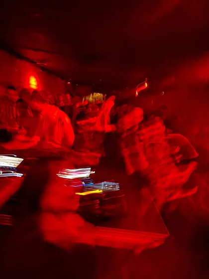 A motion-blurred shot capturing the chaotic, high-energy vibe of my set at Ferro Bar in Porto, Portugal. The red lights and movement perfectly represent the wild night.