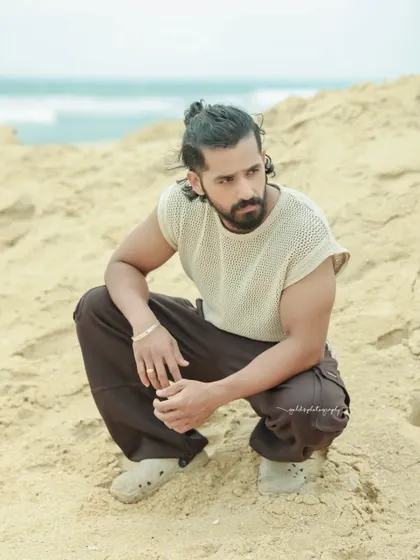 A series of portraits of actor Pruthvi Ambaar on location. These shots showcase a rugged, casual look against natural and industrial backdrops, highlighting his versatility.
