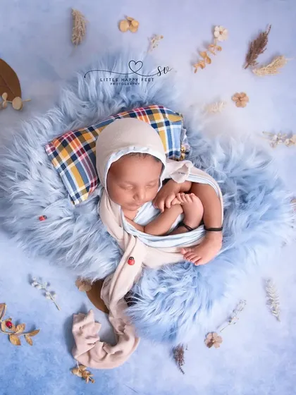 Sleeping on a cloud of blue fur. This minimalist setup uses texture and a simple color palette to create a dreamy and serene atmosphere.