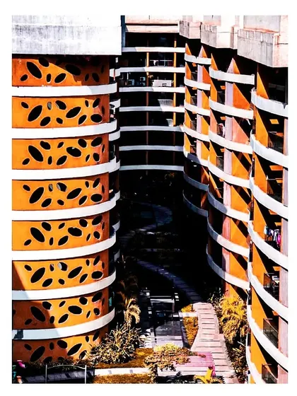 A close-up of the perforated curved brick wall at the Palm Bellagio project, showing the detail of the 'wave' design.