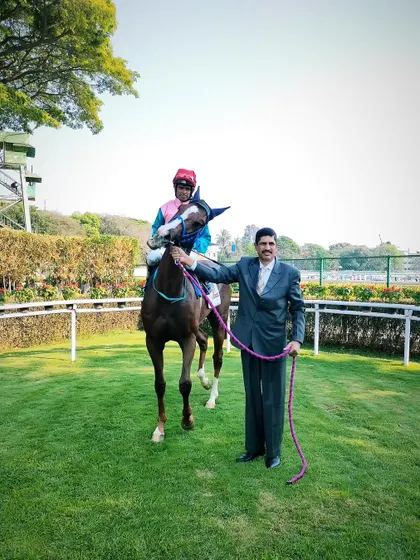 Invincible, with jockey Neeraj Rawal, after winning the memorial cup.