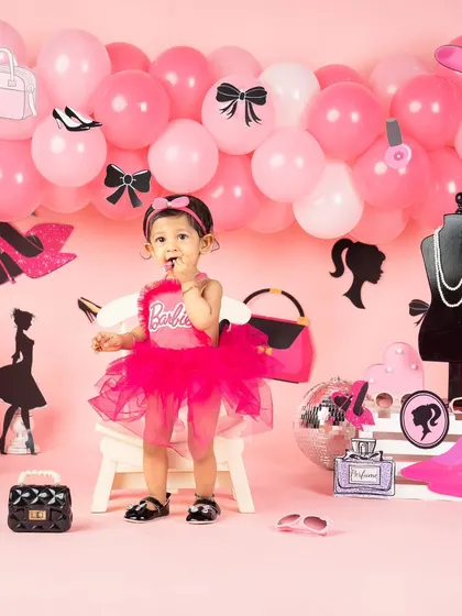 Come on Barbie, let's go party. This all-pink, fashion-themed setup is perfect for a little girl who loves to be glamorous.