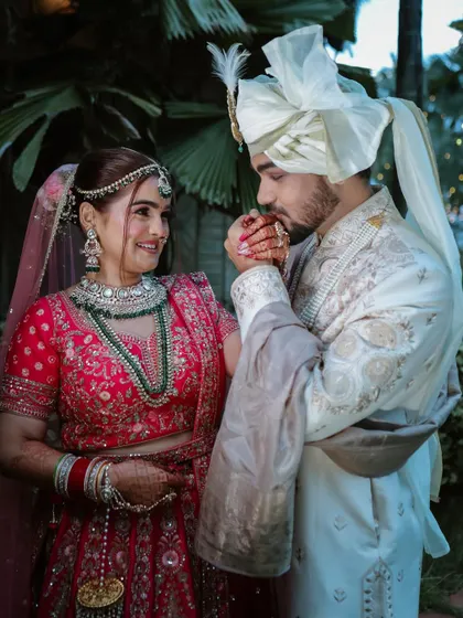 A chivalrous kiss on the hand. This is a timeless, romantic gesture that we love to capture in our wedding photography.