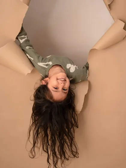 An upside-down smile from the star of the first haircut shoot. I love it when kids bring their own fun ideas to the session.