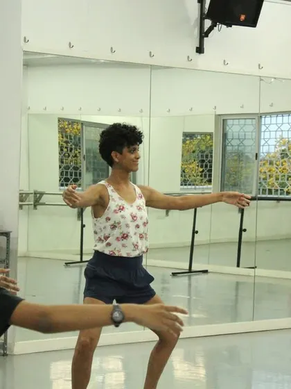 Focus and form are on display in our Cunningham Technique® class. Students learn to hold their arms and maintain their posture with precision.