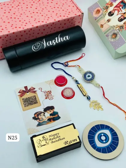 An evil eye themed Rakhi hamper for your Bhaiya and Bhabhi. It includes a name-engraved rakhi and lumba, a personalized temperature bottle, and a custom wooden box.