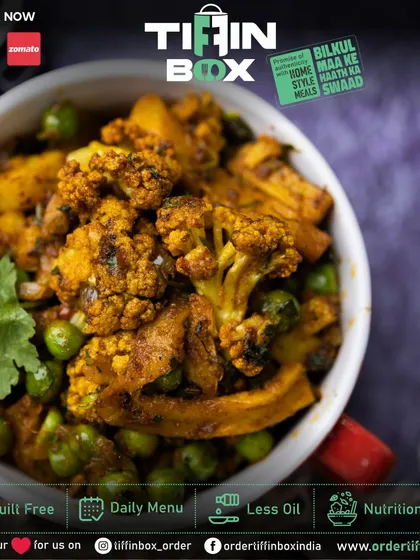 A close-up of our Aloo Gobi Matar. This dry vegetable dish is a healthy and tasty option, packed with the goodness of cauliflower, potatoes, and green peas.