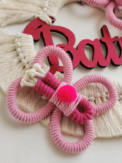 The little pink pom-pom in the center of the butterfly is such a cute detail.