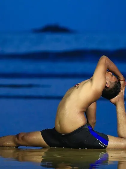 The flexibility required for this pose on Gokarna beach is a reflection of the mental flexibility yoga cultivates. It is about breaking the rigid barriers in our minds to better understand ourselves and the world.
