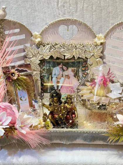 A wedding hamper is more than a gift. It's a gesture of love, beautifully curated with a personalized photo frame, sweets, and blessings. This arrangement was designed for a family to welcome their new member with warmth and elegance.