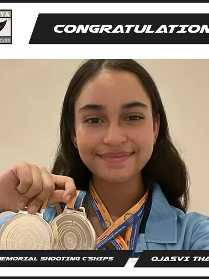 Ojasvi Thakur proudly shows her two silver medals from the KSS Memorial Shooting Championships.
