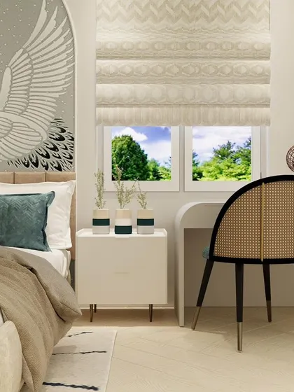 A close-up of the study nook next to the bed, featuring a sleek desk and a classic rattan chair that adds a touch of natural texture.