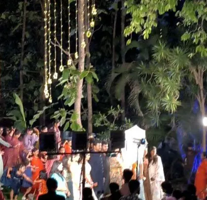 A wide view of the beautiful outdoor wedding party.