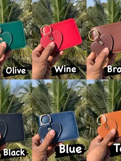 Here are the six color options for the wallet and heart keychain combo: olive, wine, brown, black, blue, and tan. You can choose the perfect color to match their style.