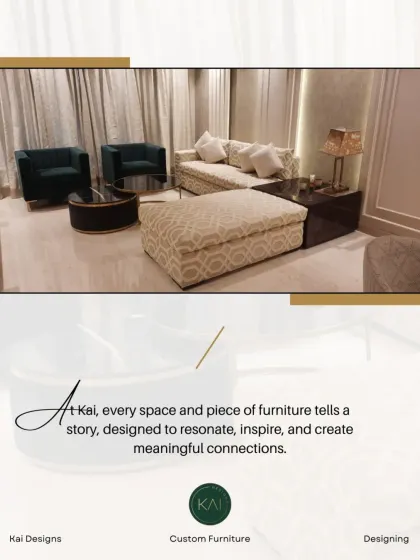 A complete living room scene we furnished, featuring a patterned sofa, dark armchairs, and a large ottoman. This project highlights our expertise in mixing textures and styles for a rich, layered look.