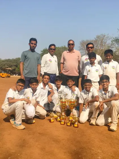 The team celebrating their series win in the Mumbai Champions Trophy. Group photos like this capture the spirit of our academy.