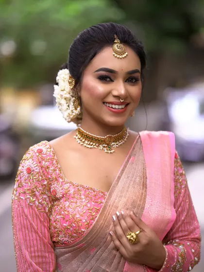 A bright, happy smile from the bride. My goal is always to create a look that makes the client feel comfortable and joyful on her special day.