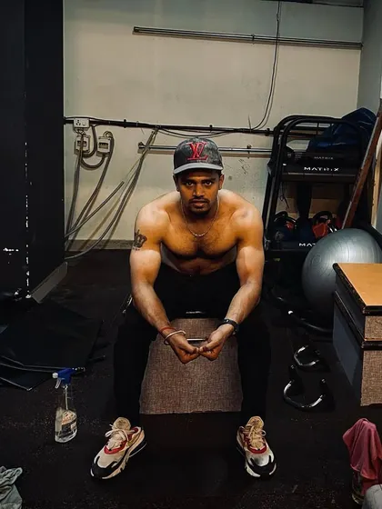 A moment of focus after a demanding session. The intensity you see here is what I help you tap into during our virtual personal training workouts.