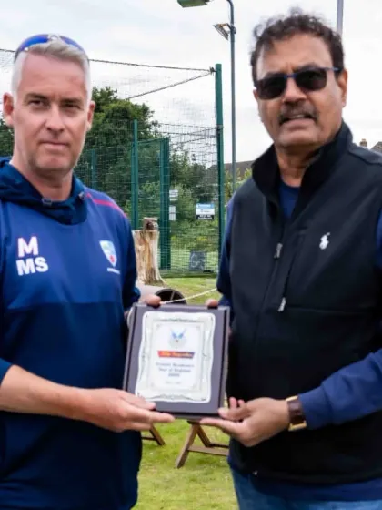 Receiving a memento from an official at the Ainsdale Cricket Club. These exchanges symbolise the strong bond we build with the local cricket community in the UK.