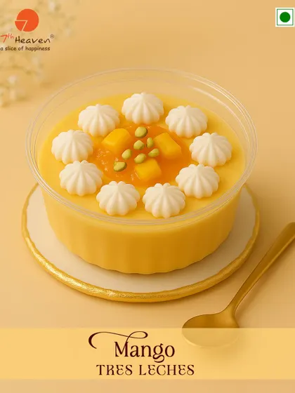 Sunshine in every spoon. Our Mango Tres Leches is a light and airy sponge cake soaked in three kinds of milk, topped with a creamy mango mousse.