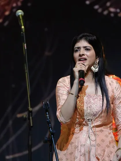 Our co-founder Vishala Khurana singing during the performance at SRMD Dharampur.