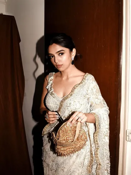 For the grand premiere of Heeramandi, I styled Ahsaas Channa in this breathtaking ivory and gold embroidered saree. The look was completed with a sparkling potli bag, embodying timeless elegance for a star studded event.