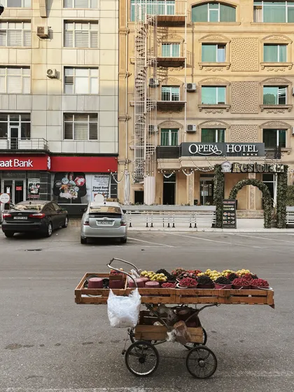 A simple fruit cart against the backdrop of Baku's architecture. I love capturing these everyday street scenes that tell a story of a place.