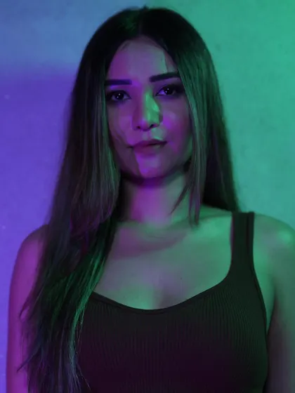 A portrait with some cool lighting. Capturing the mood for the summer season of open-air gigs.