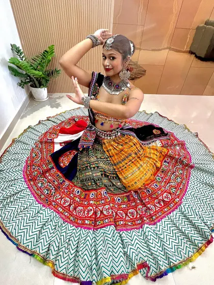 Another view of this spectacular multi-panel chaniya choli, showing the incredible volume and vibrant colors of the skirt.