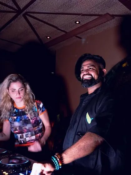 A fun moment with a fan on the dance floor at the Waikiki afterparty.