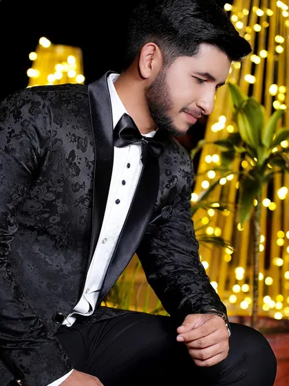 A thoughtful, low-angle shot of the groom against a beautifully lit background. This creates a dramatic and interesting portrait.