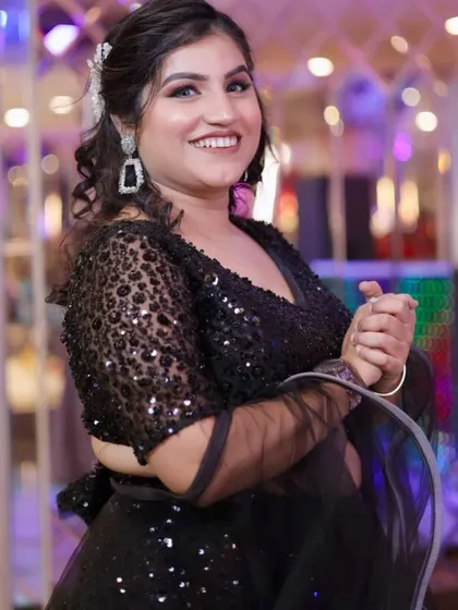 Her smile says it all! The makeup enhances her natural beauty and makes her feel ready to celebrate.