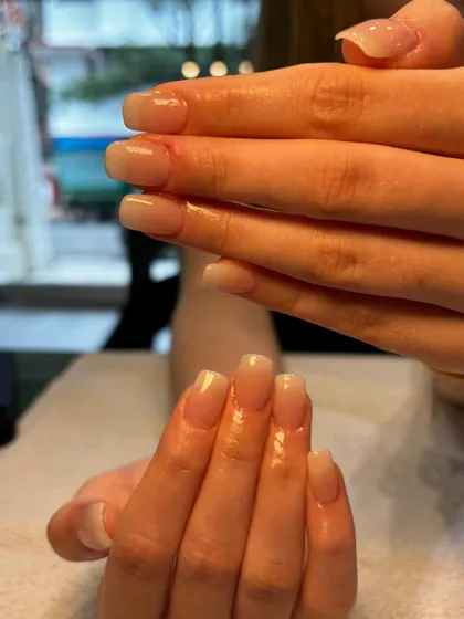 When in doubt, go for an Ombré French. Also known as baby boomer nails, this style features a seamless blend from a nude pink base to a soft white tip for a subtle and sophisticated look.