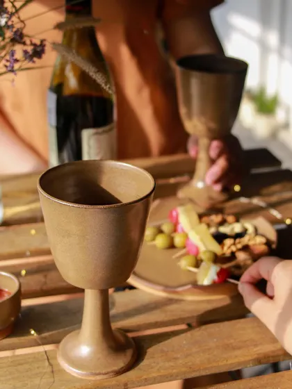 A close up of the elegant wine goblets from the 'Moments Together' collection, designed to celebrate shared moments over a favorite drink.