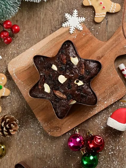 Our star-shaped plum cake is a festive twist on a classic. It's packed with the same rich, fruity flavor but in a fun, shareable shape.