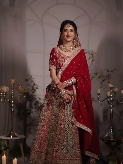 The complete bridal reception look. The makeup, hair, and outfit all come together to create a breathtaking vision of a modern North Indian bride.